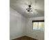 Bedroom featuring wood-look floors, window with brown blind and a ceiling fan at 470 Como Ct, Henderson, NV 89015