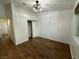 Bedroom featuring wood-look floors, closet with sliding doors, and a ceiling fan at 470 Como Ct, Henderson, NV 89015