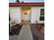 Charming front porch with decorative seasonal elements creates a warm and inviting entrance to the home at 470 Como Ct, Henderson, NV 89015