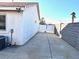 Spacious side yard featuring a private gate and concrete paving, perfect for additional parking or storage at 470 Como Ct, Henderson, NV 89015