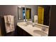 Bathroom with dual sink vanity, a large mirror, and neutral colored towels at 4928 Indigo Gorge Ave, Las Vegas, NV 89131