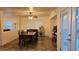 An open dining room with tile flooring and a ceiling fan at 4928 Indigo Gorge Ave, Las Vegas, NV 89131