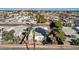 Aerial view showcasing the property's surroundings within a vibrant community and mountain views at 5217 Sir James Way, Las Vegas, NV 89110