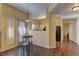 Dining area with modern light fixtures, a breakfast bar, and hardwood floors at 5250 S Rainbow Blvd # 1121, Las Vegas, NV 89118