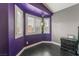 Charming bay window nook with shutters and a hanging plant in a colorful bedroom at 58 Desert Sunflower Cir, Henderson, NV 89002