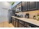 Cozy kitchen with modern appliances, light countertops, and ample cabinet space for storage at 58 Desert Sunflower Cir, Henderson, NV 89002