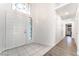 Bright entryway featuring tile flooring, decorative stained glass window, and closet at 60 Reyburn Dr, Henderson, NV 89074