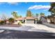 Charming single-story home with desert landscaping, tile roof and a two car garage at 60 Reyburn Dr, Henderson, NV 89074