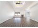 Bright living room with fireplace, skylight, and large windows at 60 Reyburn Dr, Henderson, NV 89074