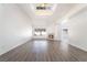 Bright living room with fireplace, skylight, and large windows at 60 Reyburn Dr, Henderson, NV 89074