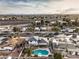 Aerial shot of the property featuring the pool, house and surrounding landscape at 6240 Clarice Ave, Las Vegas, NV 89107