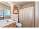 This bathroom features a sink, toilet and shower-tub at 6240 Clarice Ave, Las Vegas, NV 89107