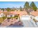 Well maintained single story home with desert landscaping at 6424 Old Colonial Way, Las Vegas, NV 89108