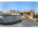 The backyard has an above-ground pool with solar panels on the roof at 6717 Atwood Ave, Las Vegas, NV 89108