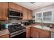 Kitchen area with lots of counter space and a stainless steel oven at 6717 Atwood Ave, Las Vegas, NV 89108