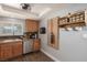 Kitchen featuring a stainless steel dishwasher and lots of cabinet space at 6717 Atwood Ave, Las Vegas, NV 89108