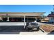 Carport view showing parking, metal roof, and surrounding vehicles at 701 Bourbon St # G3, Pahrump, NV 89048