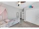 A bedroom featuring a canopy bed and closet with sliding doors at 7153 Tavita St, Las Vegas, NV 89113