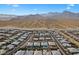 An aerial view of a desert community with mountain views in the background at 733 Aberdeen Tartan St, Las Vegas, NV 89138