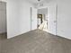 A bright bedroom with white walls and neutral carpet at 7400 W Flamingo Rd # 2022, Las Vegas, NV 89147