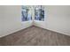 Bedroom featuring light-colored carpet, lots of natural light at 7400 W Flamingo Rd # 2022, Las Vegas, NV 89147