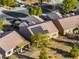 Aerial view of the home's rear exterior featuring solar panels, covered patio, and desert landscaping at 7505 Chaffinch St, North Las Vegas, NV 89084