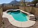 Sparkling pool and spa offer a refreshing backyard retreat with mountain views, perfect for outdoor relaxation at 767 Durgos Dr, Henderson, NV 89012