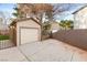 Detached garage with secure gate access and extra parking space, perfect for storage or workshop at 7840 Red Leaf Dr, Las Vegas, NV 89131