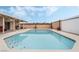 Inviting pool with a sunny patio, barbecue, and desert landscape at 845 Palo Verde Dr, Henderson, NV 89015