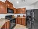 Efficient kitchen with stainless steel appliances and ample cabinet space at 9734 Cluny Ave, Las Vegas, NV 89178