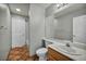 This bathroom features a white sink, toilet and shower at 1 Rising Sun Ct, Henderson, NV 89074