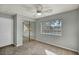 This bedroom has a ceiling fan and mirrored closet doors at 1 Rising Sun Ct, Henderson, NV 89074