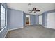 Bedroom with a ceiling fan and ensuite bathroom access at 1 Rising Sun Ct, Henderson, NV 89074