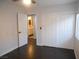 Bright bedroom featuring a spacious closet and an open doorway to a pristine, well-lit bathroom at 10773 Wildhurst St, Las Vegas, NV 89183