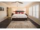 Primary bedroom featuring dark wood floors and neutral color walls at 1100 Paradise Coach Dr, Henderson, NV 89002