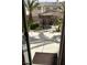 View of the backyard with a gazebo, palm trees, and easy-to-maintain landscaping at 11118 Scotscraig Ct, Las Vegas, NV 89141