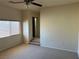 The bedroom has carpet, window, ceiling fan, and closet providing a cozy space at 11118 Scotscraig Ct, Las Vegas, NV 89141