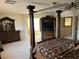 Luxury main bedroom features neutral carpet, and an entertainment center at 11118 Scotscraig Ct, Las Vegas, NV 89141