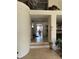 View of foyer with tile floors leading to dining room area and open living space at 11118 Scotscraig Ct, Las Vegas, NV 89141