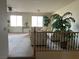 Upstairs living room featuring neutral carpet, a ceiling fan, and natural light from multiple windows at 11118 Scotscraig Ct, Las Vegas, NV 89141