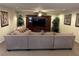 Comfortable living room features a large sectional sofa and built-in entertainment center at 11118 Scotscraig Ct, Las Vegas, NV 89141
