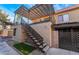 Exterior shot of condo with staircase leading to the unit at 1888 Apricot Ct, Henderson, NV 89014