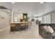 Open-concept kitchen with a breakfast bar, modern lighting, and seamless flow to living area at 2010 Spruce Brook Dr, Henderson, NV 89074