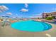 Stunning outdoor pool with clear blue water, perfect for relaxation and enjoying sunny days at 2215 Bensley St, Henderson, NV 89044