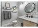 Renovated bathroom with subway tile, updated fixtures, and decorative tile flooring at 2241 Verde Cape Ave, Henderson, NV 89052