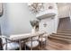 Cozy dining area featuring hardwood floors, modern decor and chandelier at 2241 Verde Cape Ave, Henderson, NV 89052
