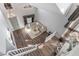 Elevated view showcasing a well-lit living area with modern decor and a neutral color palette at 2241 Verde Cape Ave, Henderson, NV 89052