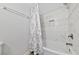 A clean bathroom boasting a tub and shower with modern tile accents and sleek fixtures at 2300 E Silverado Ranch Blvd # 2040, Las Vegas, NV 89183