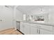 Modern kitchen featuring white cabinets, stainless steel appliances, and quartz countertops at 2300 E Silverado Ranch Blvd # 2040, Las Vegas, NV 89183