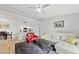 An open floor plan shows the living room, dining area, and kitchen, all with natural light and wood-look floors at 2300 E Silverado Ranch Blvd # 2040, Las Vegas, NV 89183